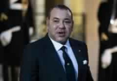 محمد السادس يؤكد من باريس ضرورة حماية البشر والحجر